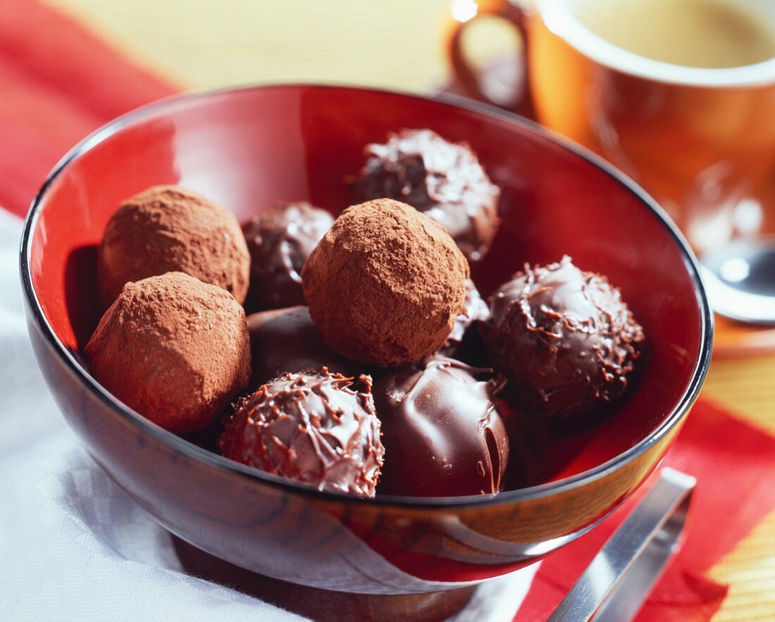 Cappuccino chocolates in red bowl