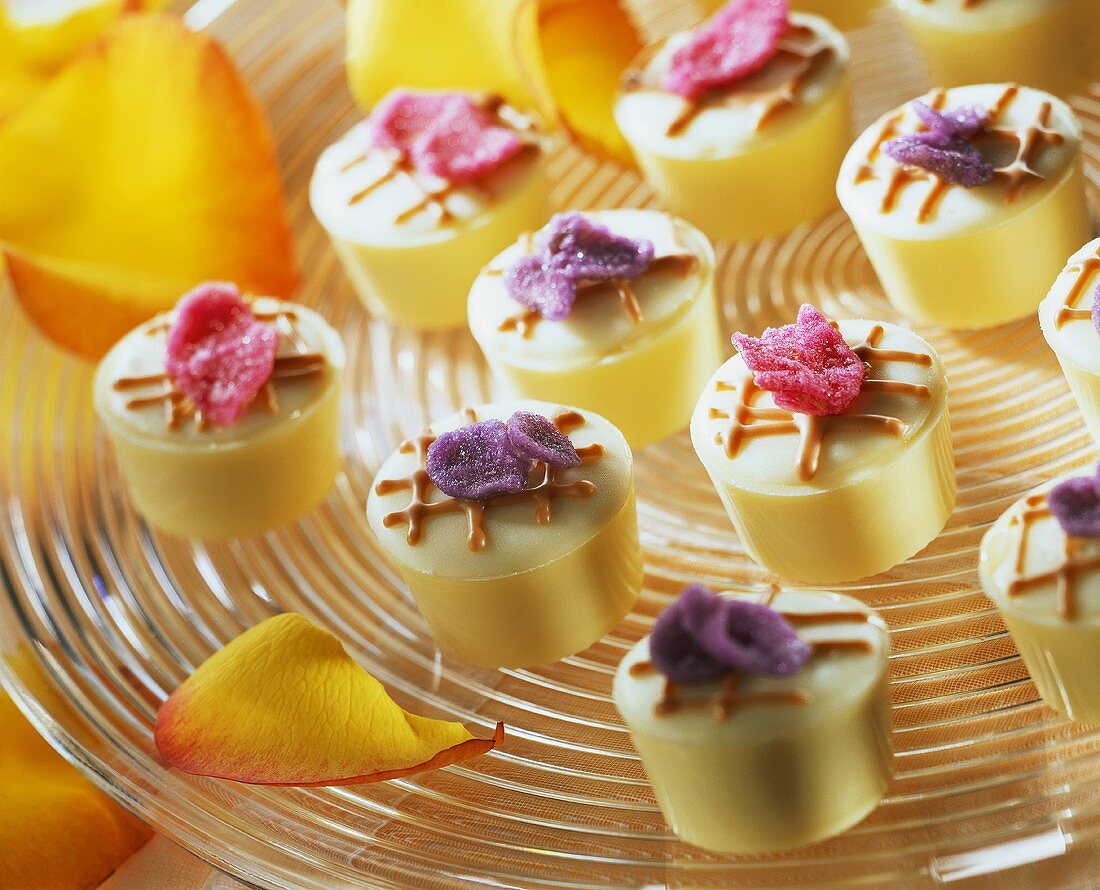 Mascarpone & cassis chocolates with candied flower petals