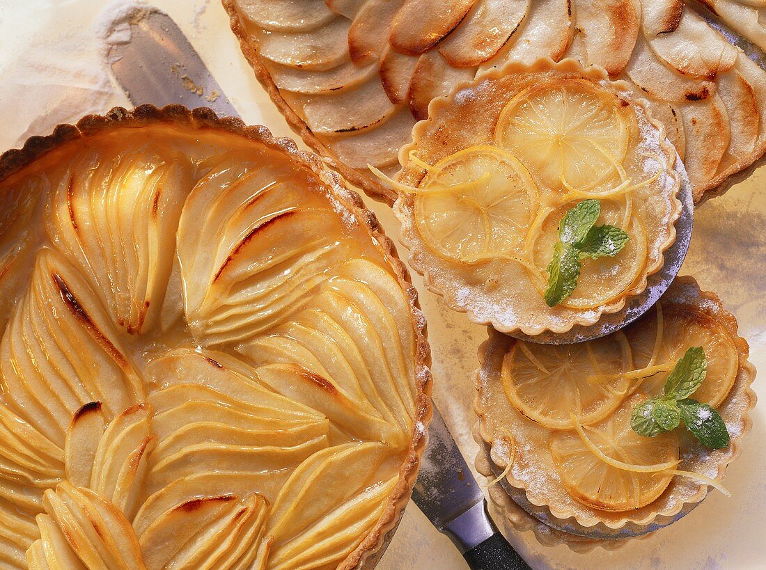 Pear tart, lemon tartlets and apple tart