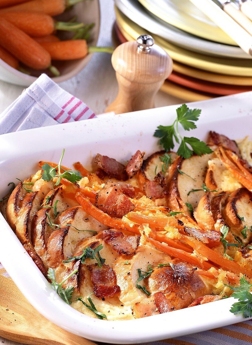 Bread casserole (Ofenschlupfer) with carrots and bacon