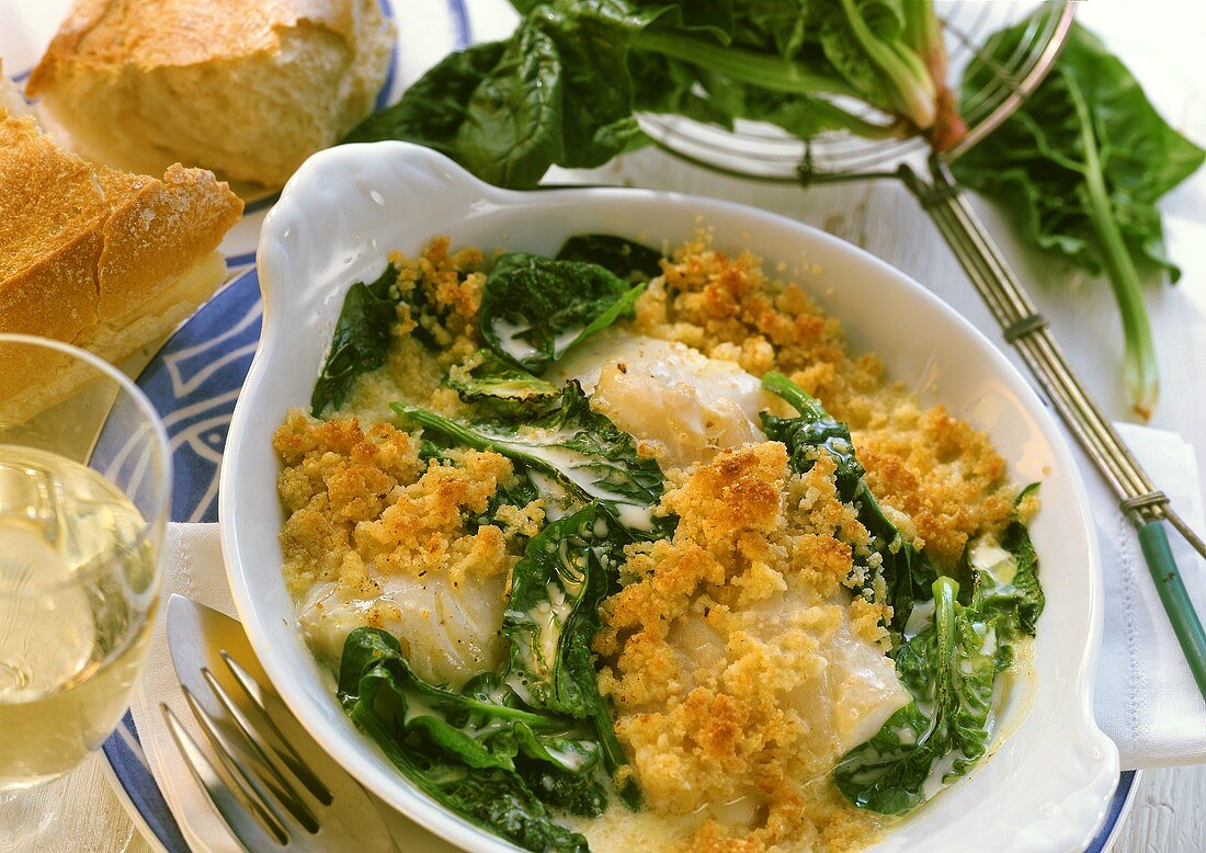 Haddock with spinach crust in a gratin dish