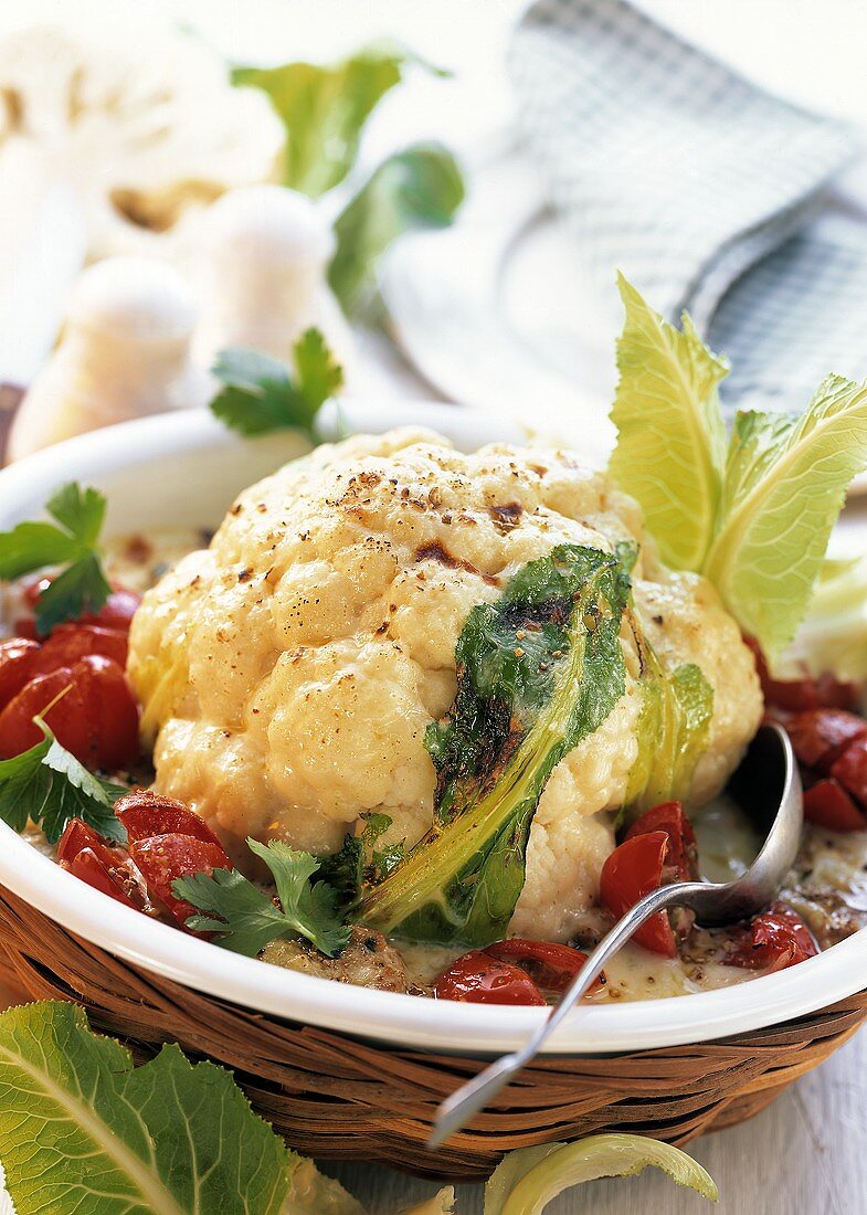 Cauliflower in mince ring with cherry tomatoes