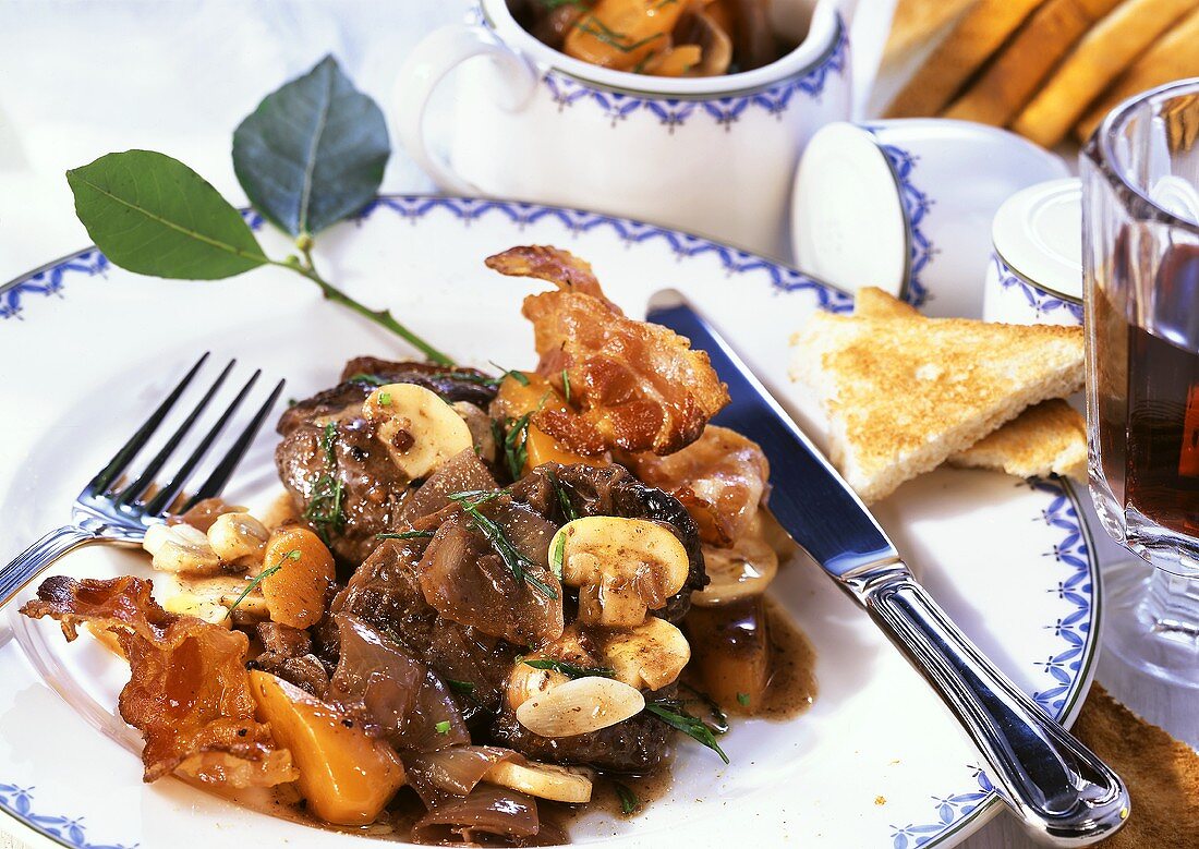 Boeuf bourguignon with bacon, carrots and mushrooms