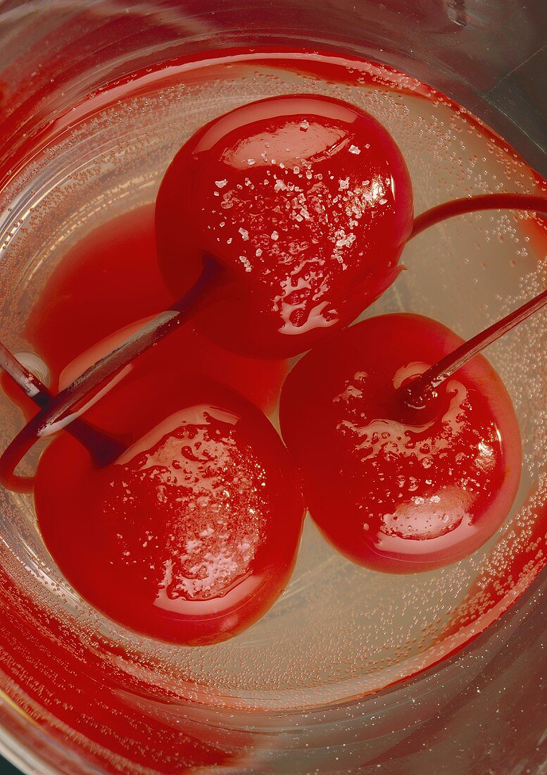 Cherry cocktail with champagne and sugar