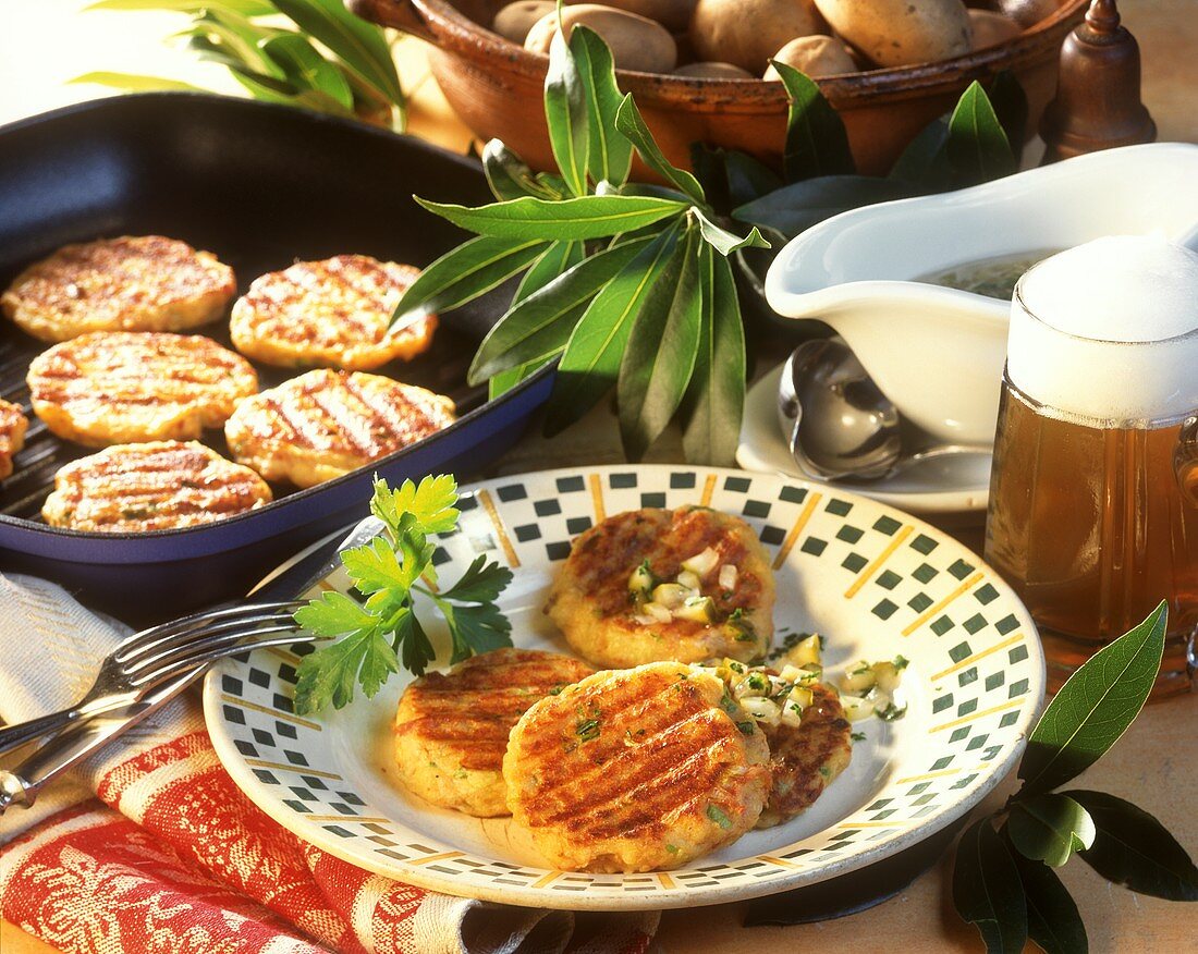 Potato cakes with rillettes and vinaigrette; beer