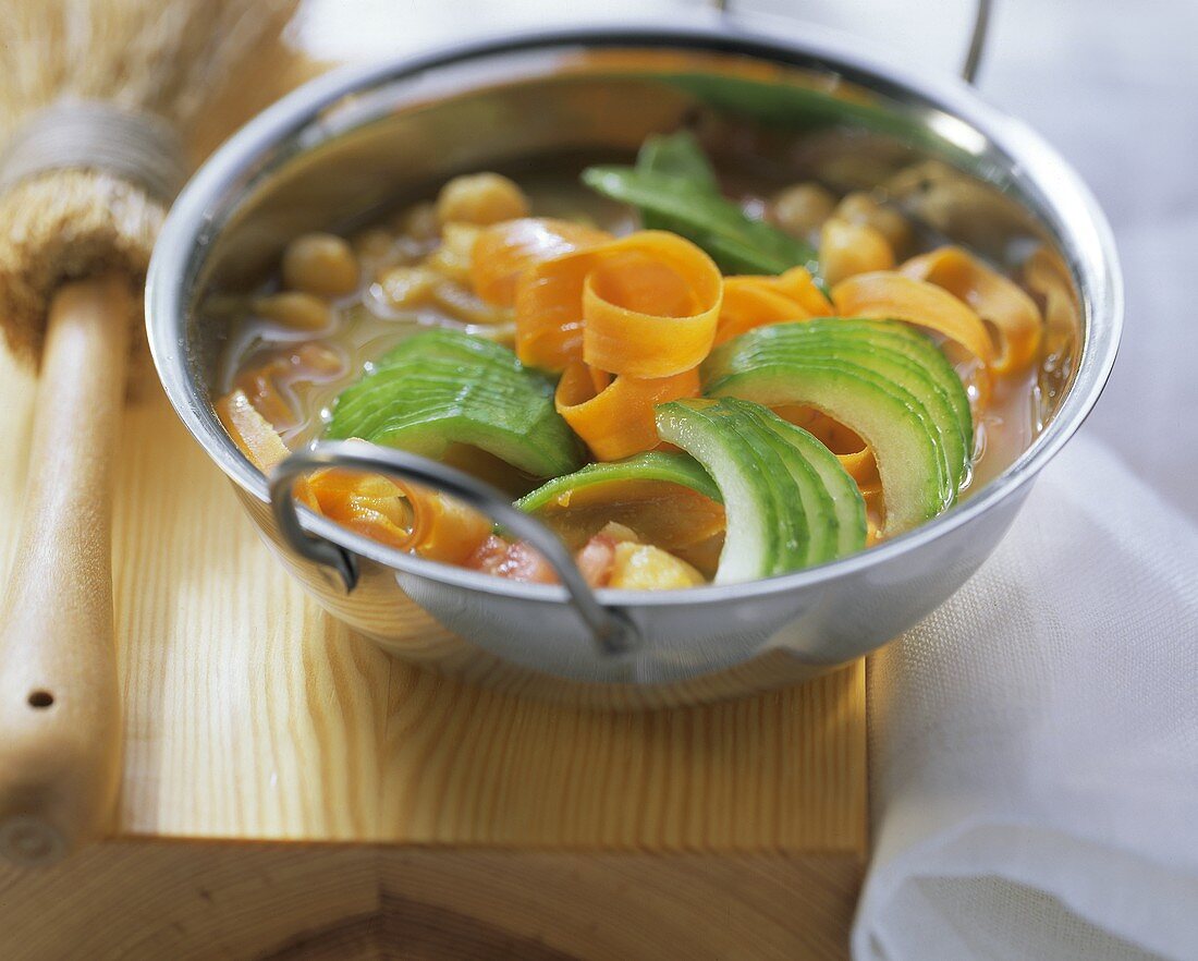 Asian vegetable soup with cucumber and carrots