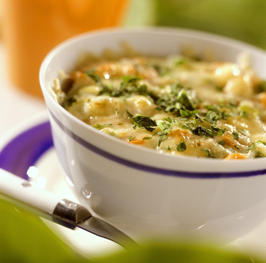 Baked chicken and vegetable ragout in soup cup