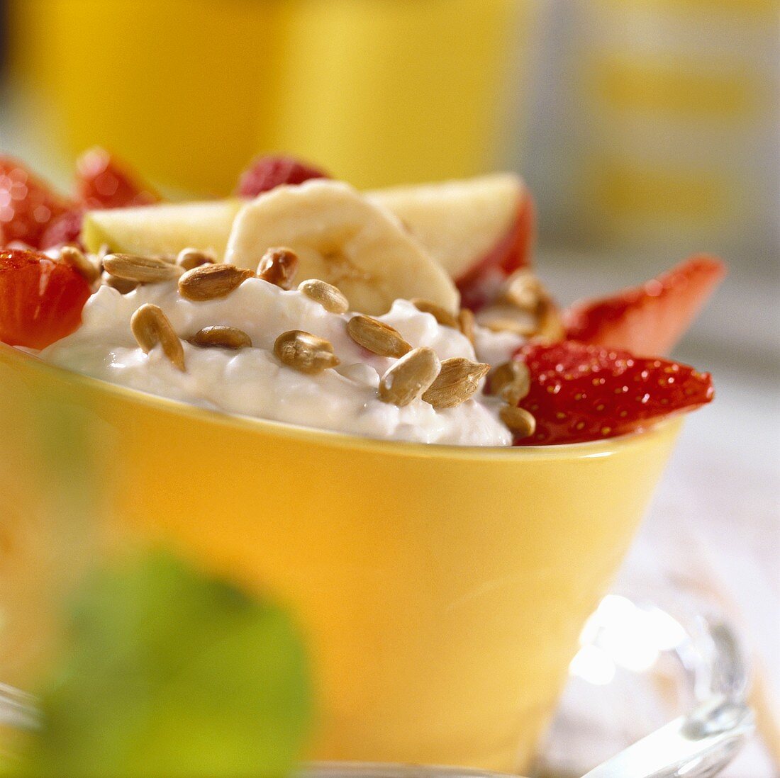 Fruit with soft cheese and sunflower seeds