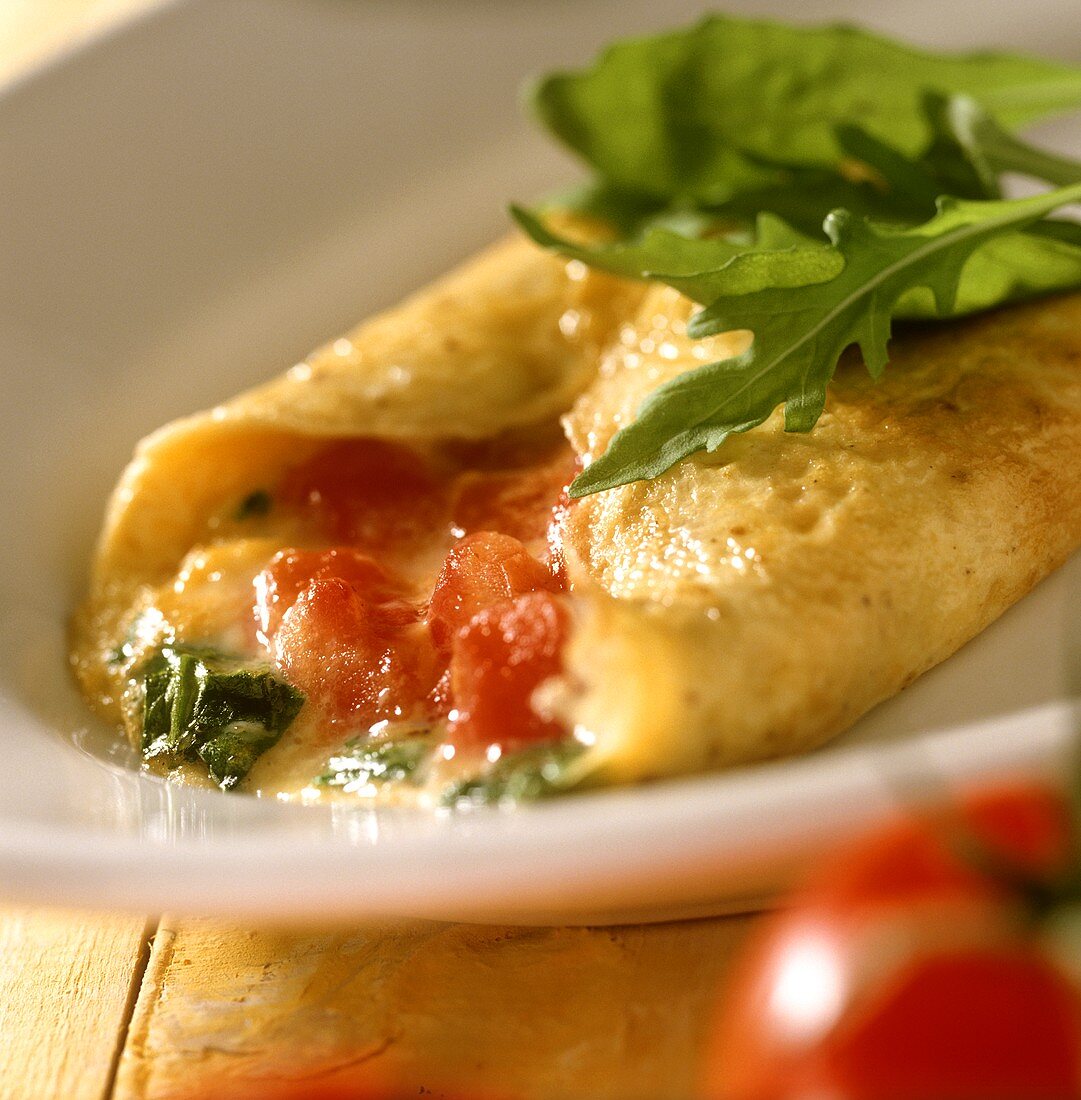 Tomato omelette with rocket