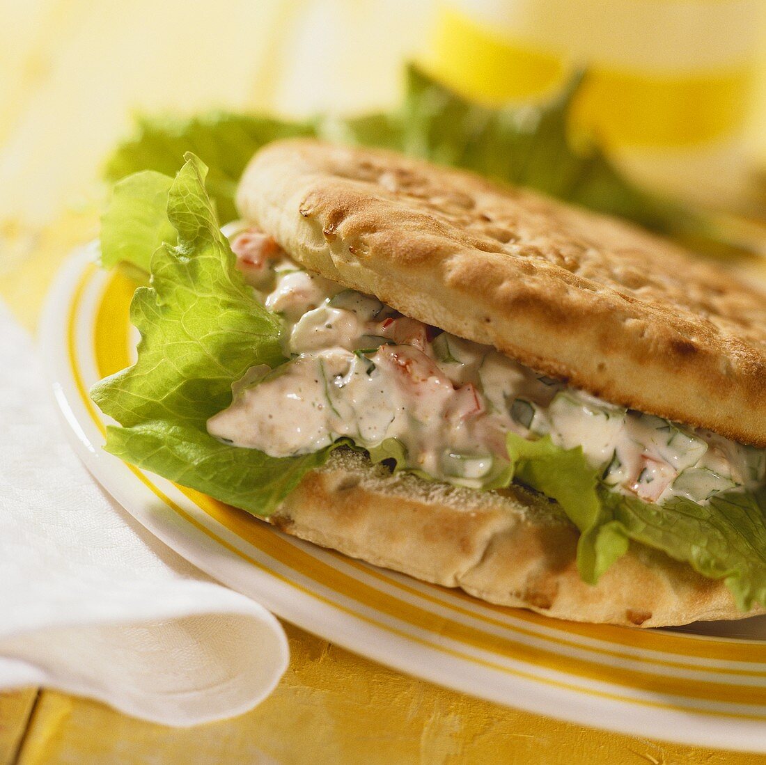 Filled pitta bread with tuna and salad leaves