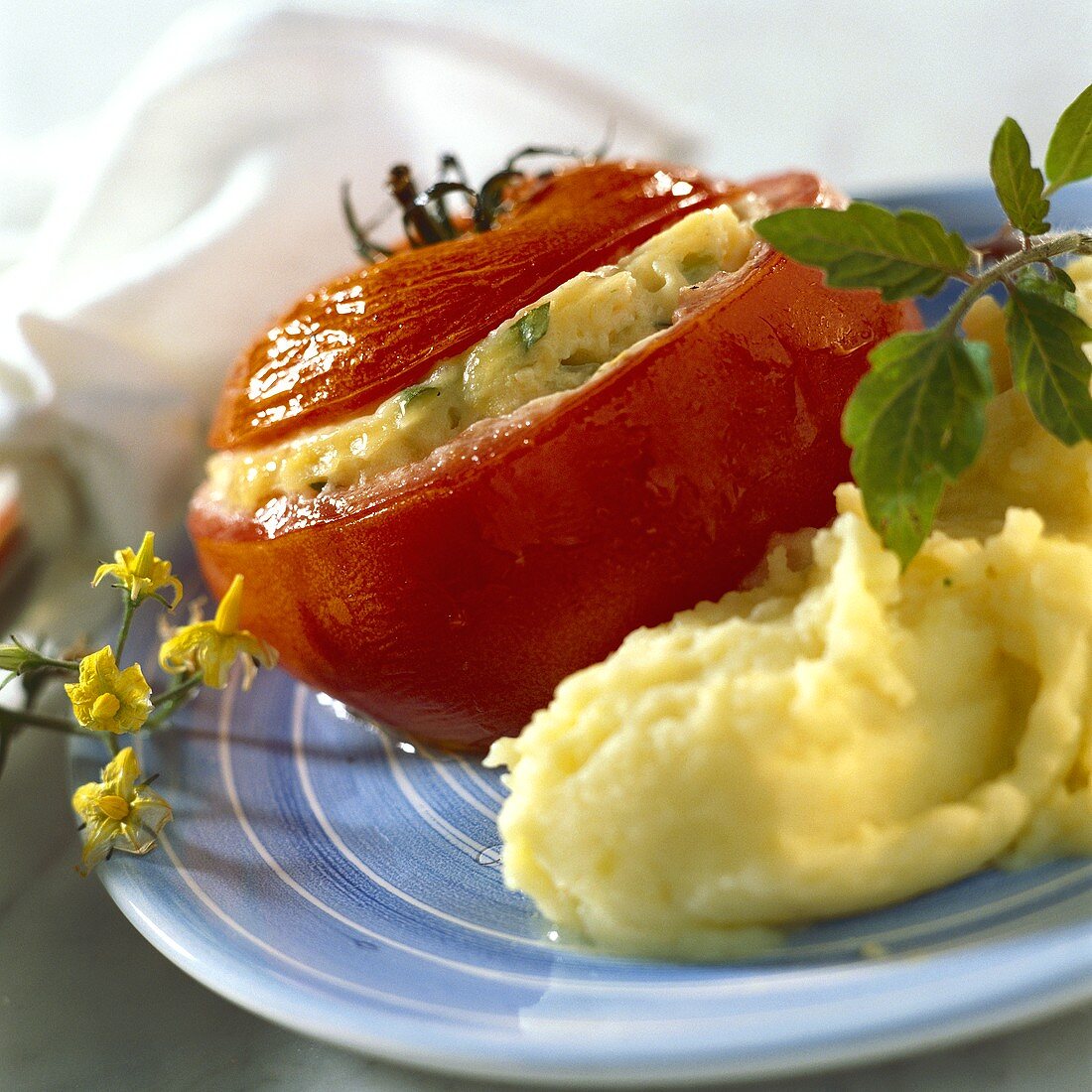 Stuffed tomatoes with ramsons (wild garlic) & mashed potato