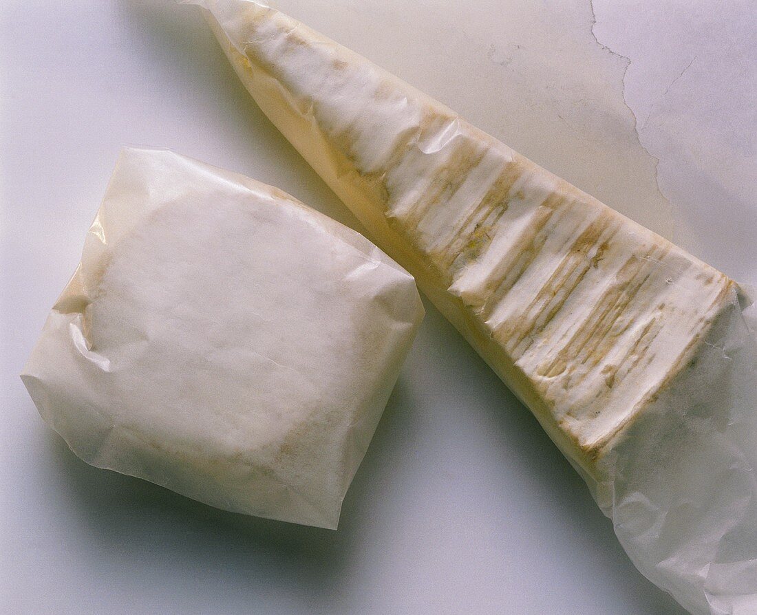 Soft cheese, packed in greaseproof paper