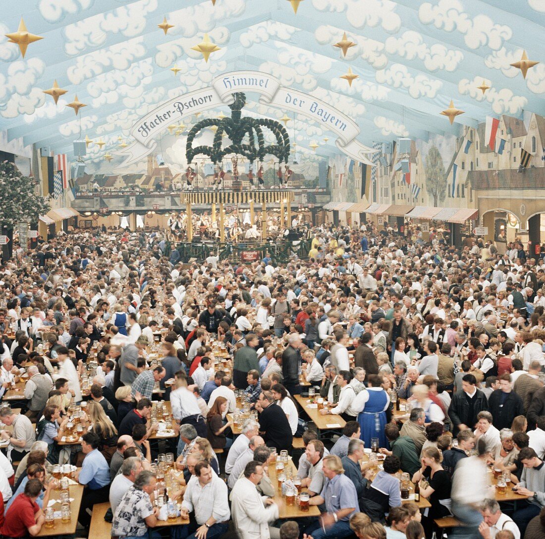 Crowd scene in a beer tent at Oktoberfest
