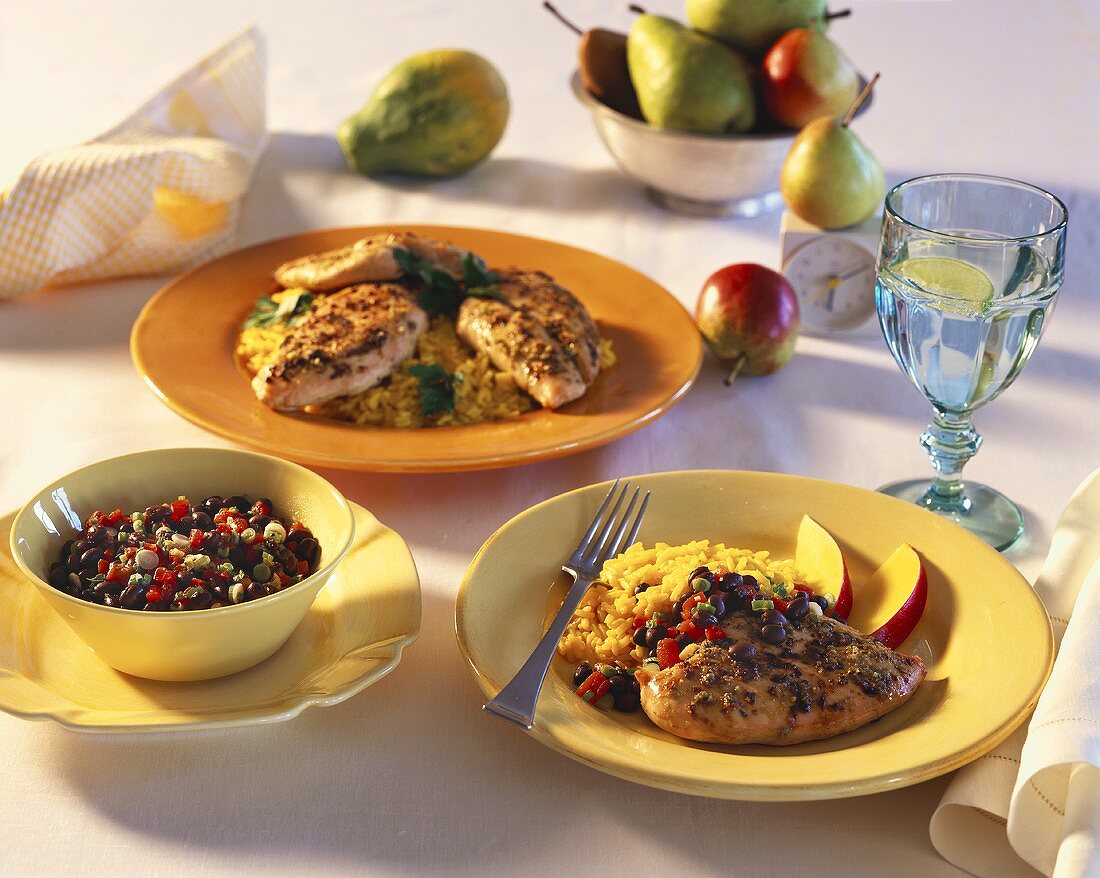 Chicken breast with rice and bean and tomato salad; pears