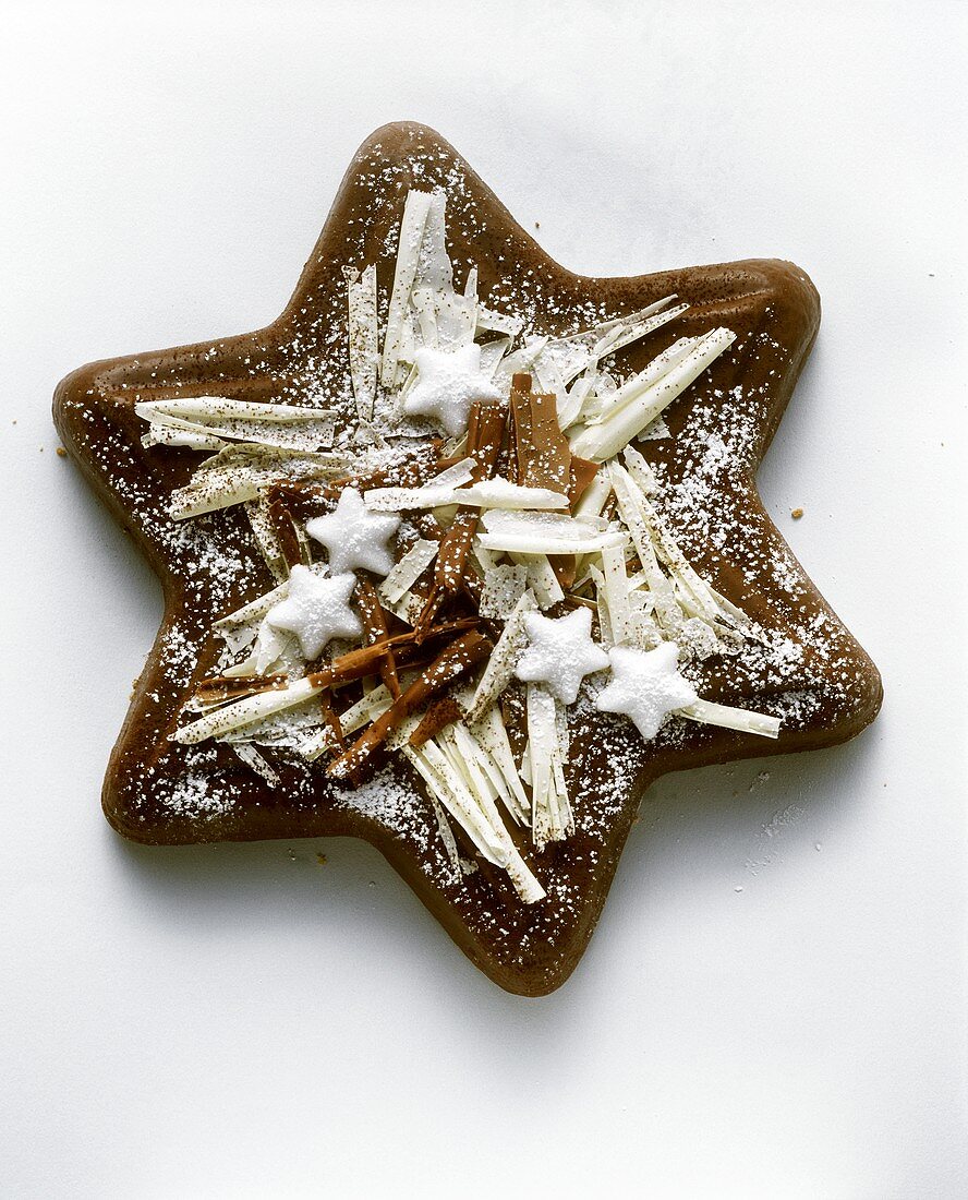 Star cake with chocolate and icing sugar