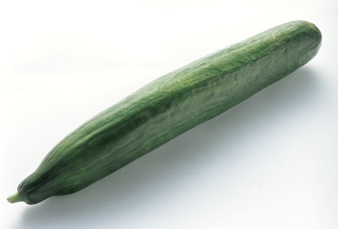A cucumber on a white background