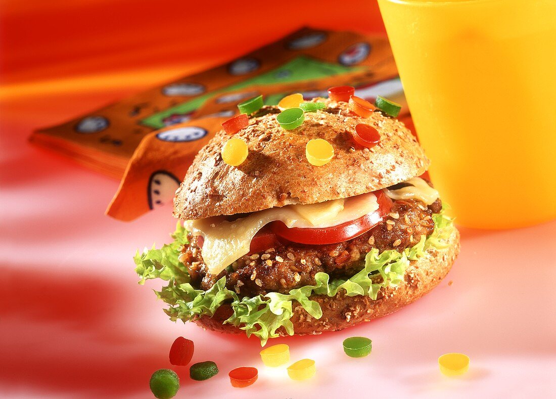 Confetti burger with pieces of pepper in front of napkins