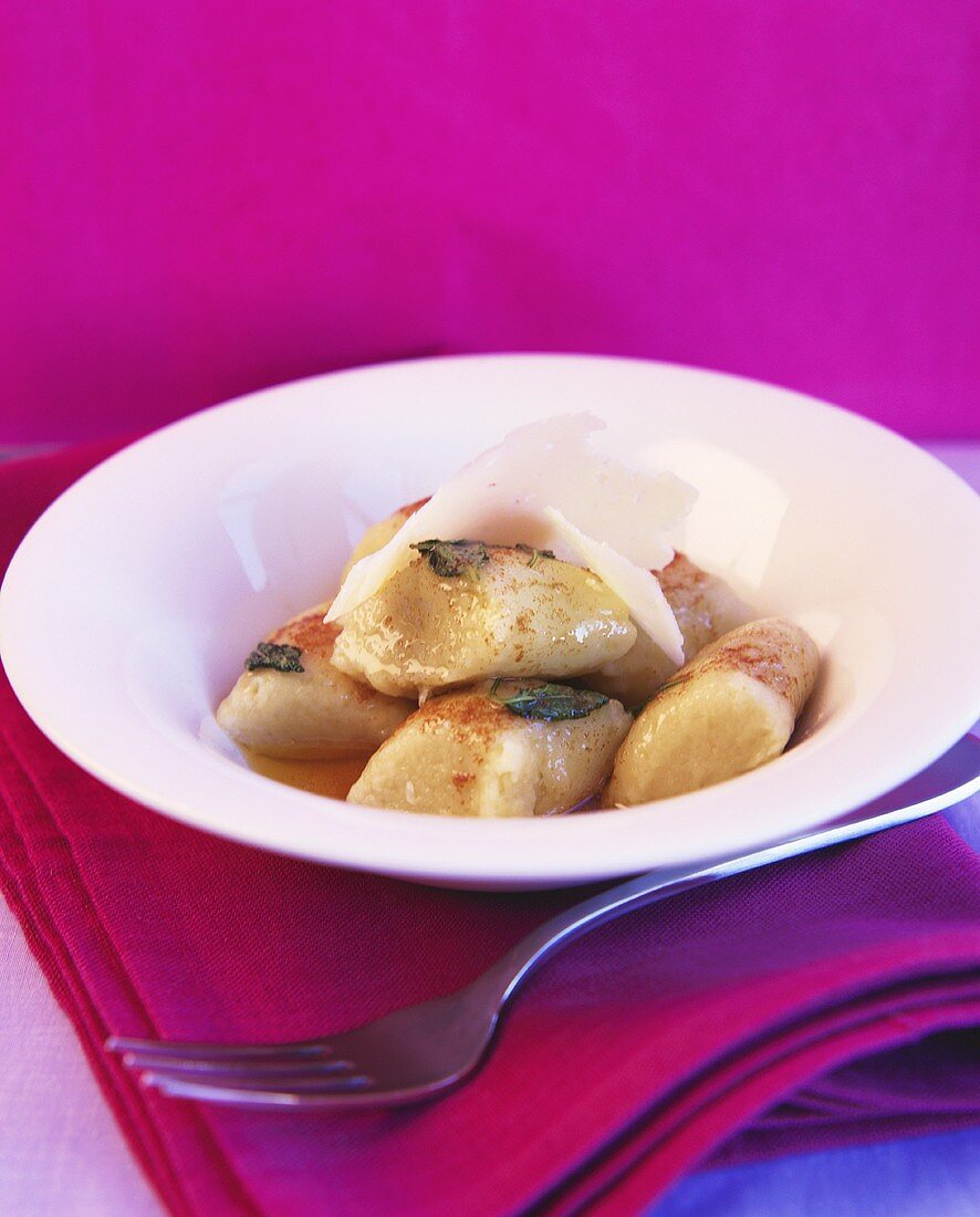 Gnocchi with cinnamon, sage and Parmesan curls