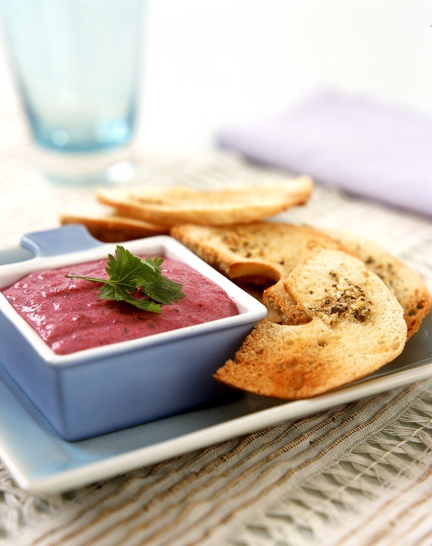Beetroot dip with toasted bagels