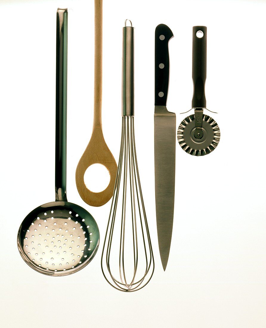 Various kitchen tools: knife, whisk, ladle etc 