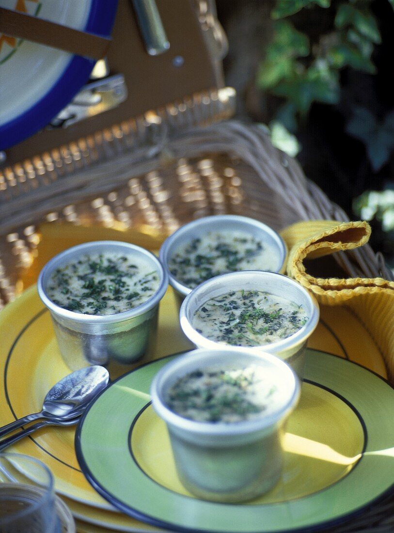 Herb mousse in small bowls for picnic