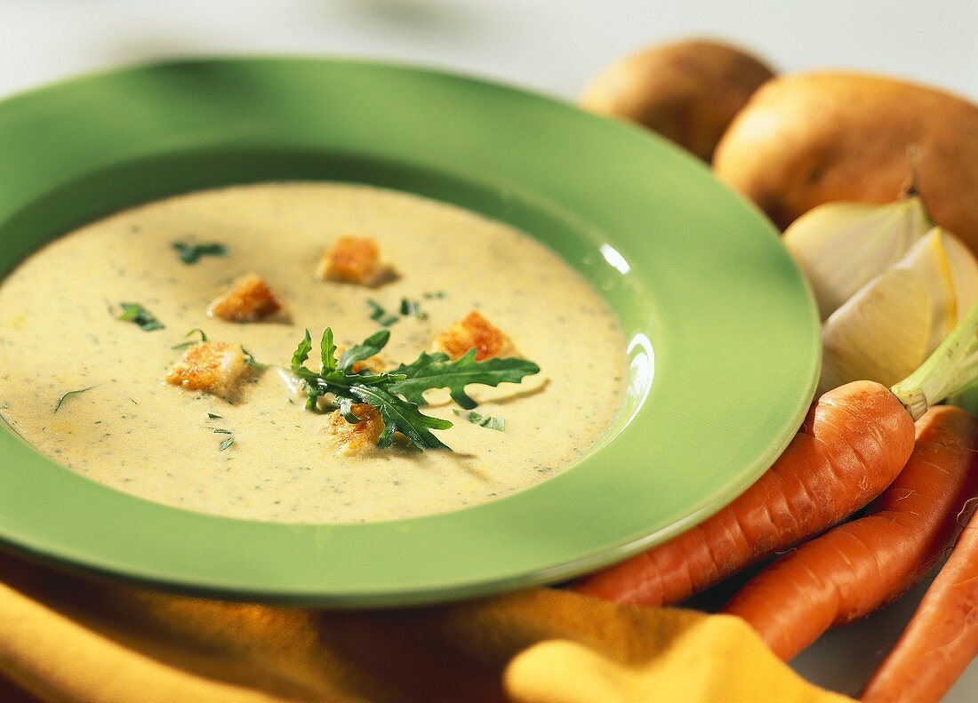 Carrot soup with rocket and croutons