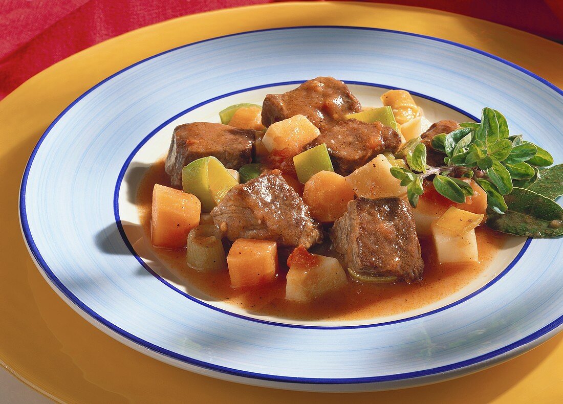 Beef with vegetables on a plate
