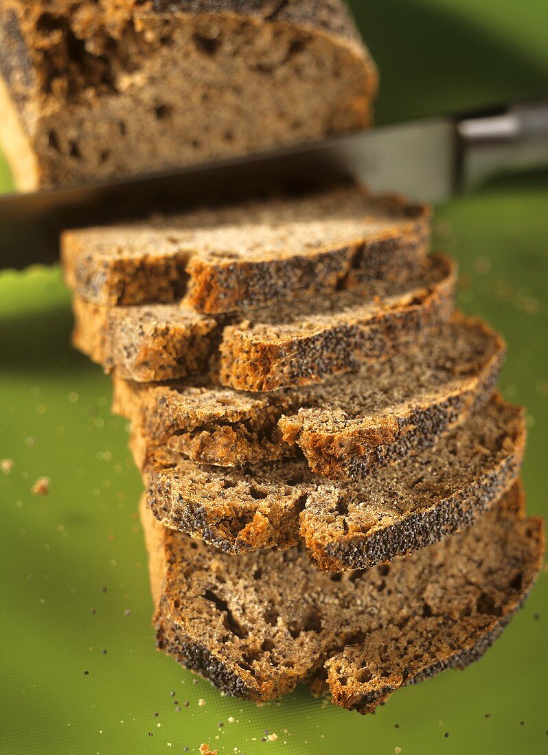 Poppy seed bread, partly sliced