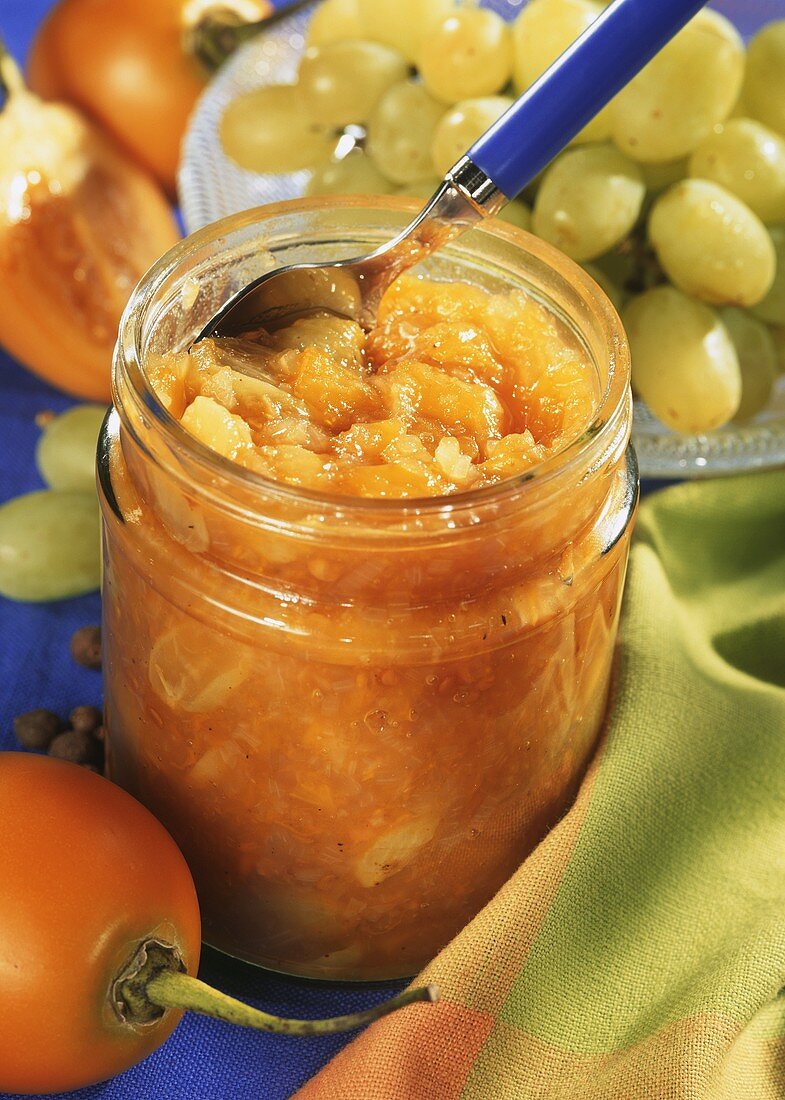 Tamarillo and grape chutney in jar