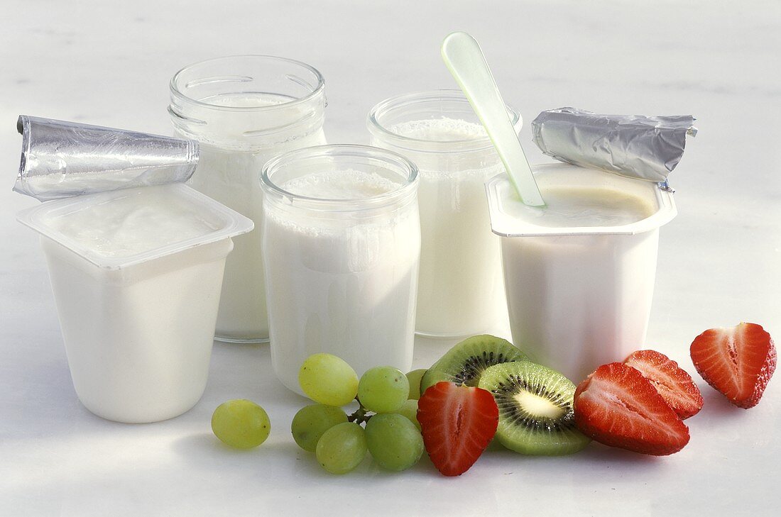 Three jars of yoghurt, two pots of yoghurt & fresh fruit