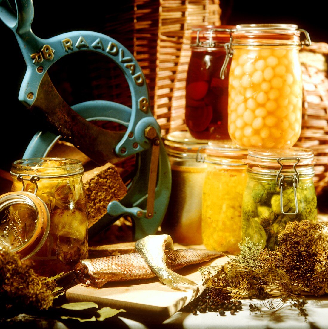 Herrings; bottled vegetables in jars; dried herbs