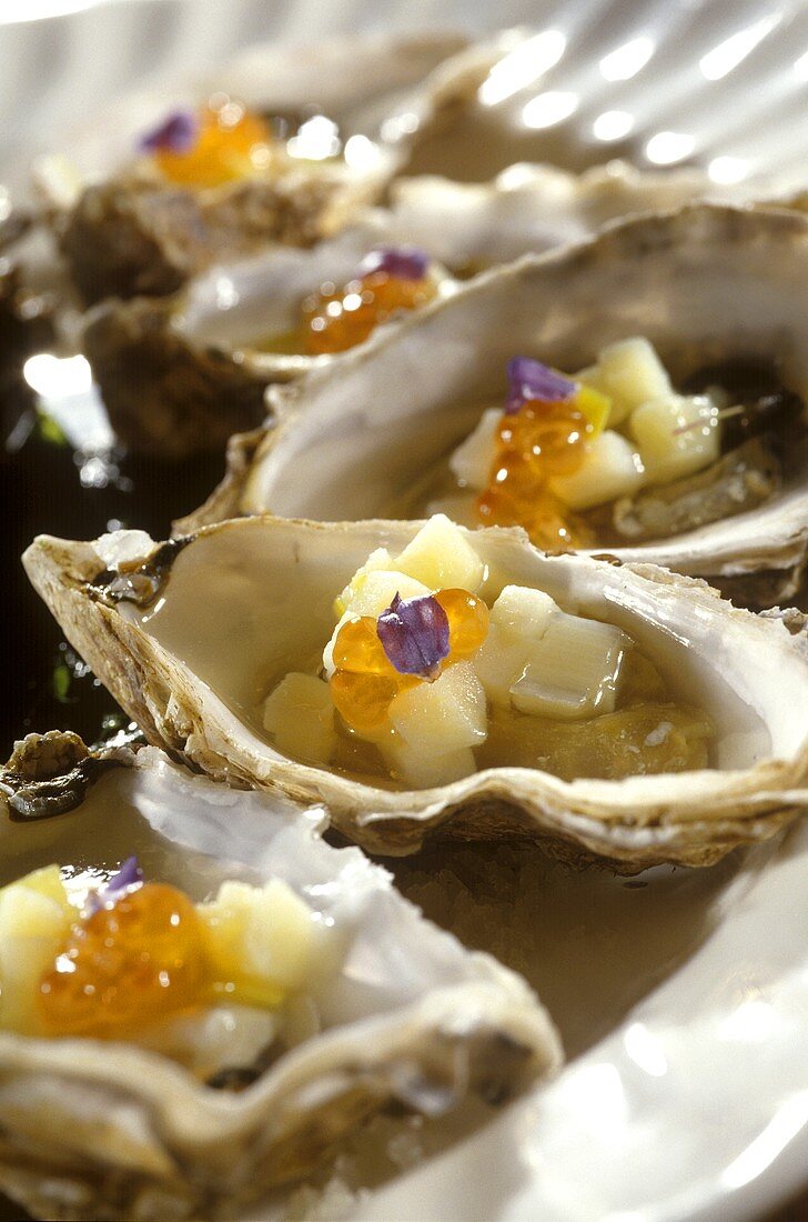 Oysters with apple cubes and caviare
