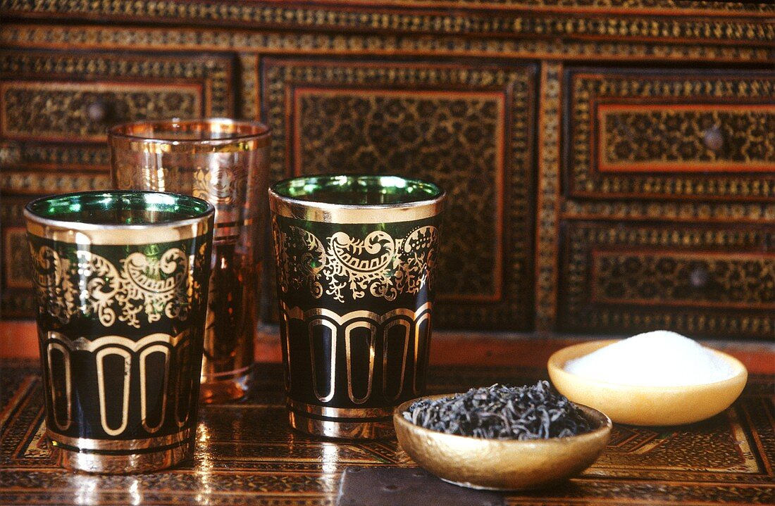 Moroccan tea glasses and tea leaves