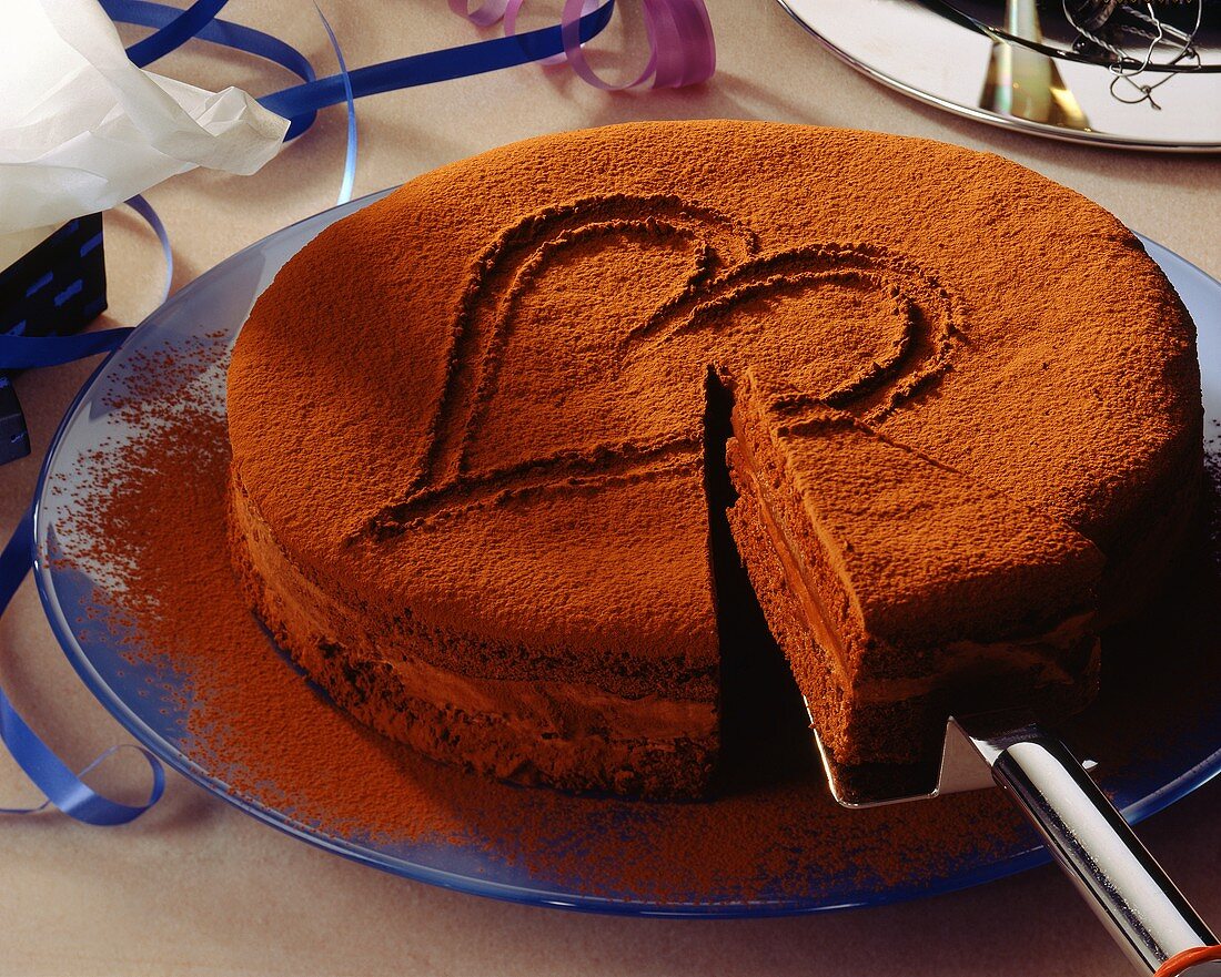 Chocolate cake with cocoa and heart decoration