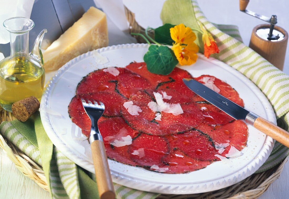 Carpaccio (Slices of raw beef fillet with Parmesan & oil)