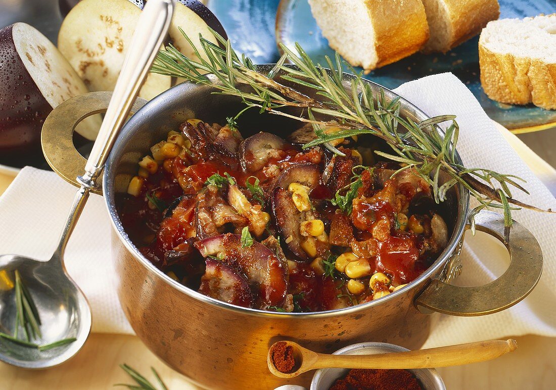 Spicy pork goulash with aubergines & sweetcorn in pot