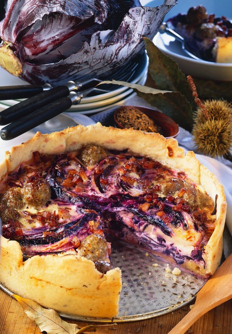 Red cabbage quiche with sausage and bacon