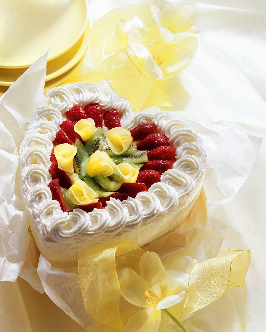 Mother's Day heart with cream, strawberries and kiwis