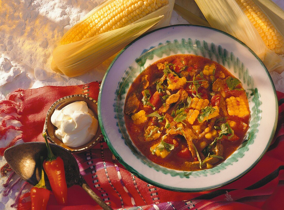 Chili with sweetcorn on plate