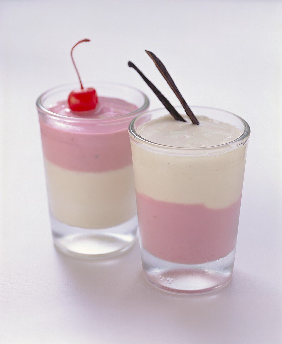 Twin-shake with raspberry and vanilla milk in two glasses