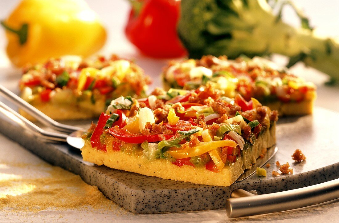 Polenta pizza with peppers and broccoli