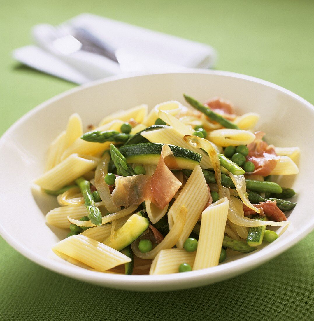 Penne with vegetables and parma ham