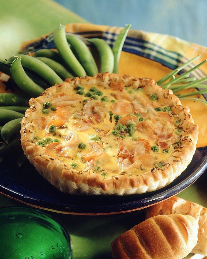 Quiche Lorraine with bacon, peas and cheese