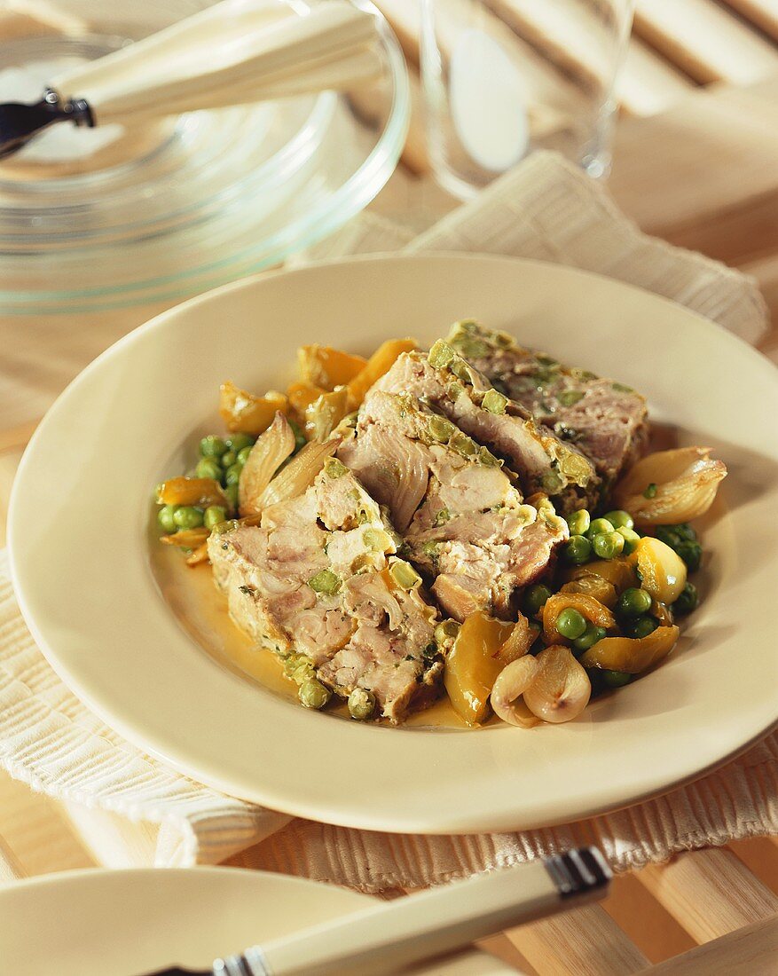 Meat terrine with peas and onions