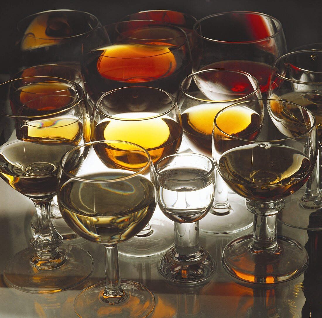Various wines and spirits in glasses