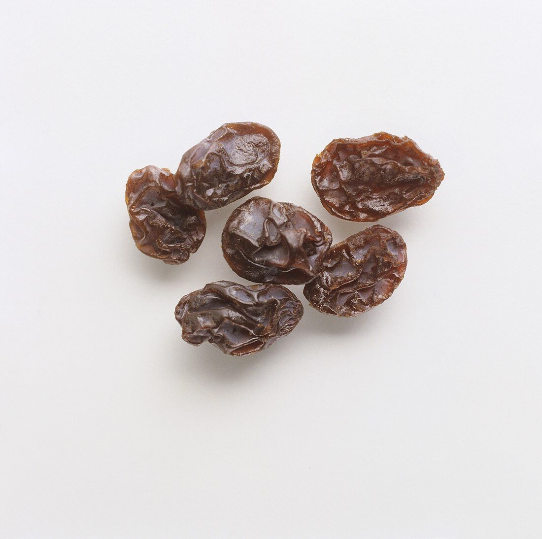 Raisins on a white background