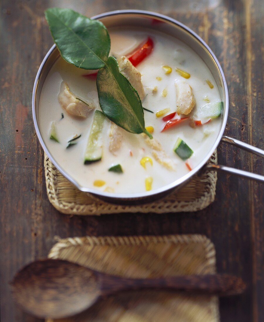 Chicken soup with coconut milk and lemon leaves