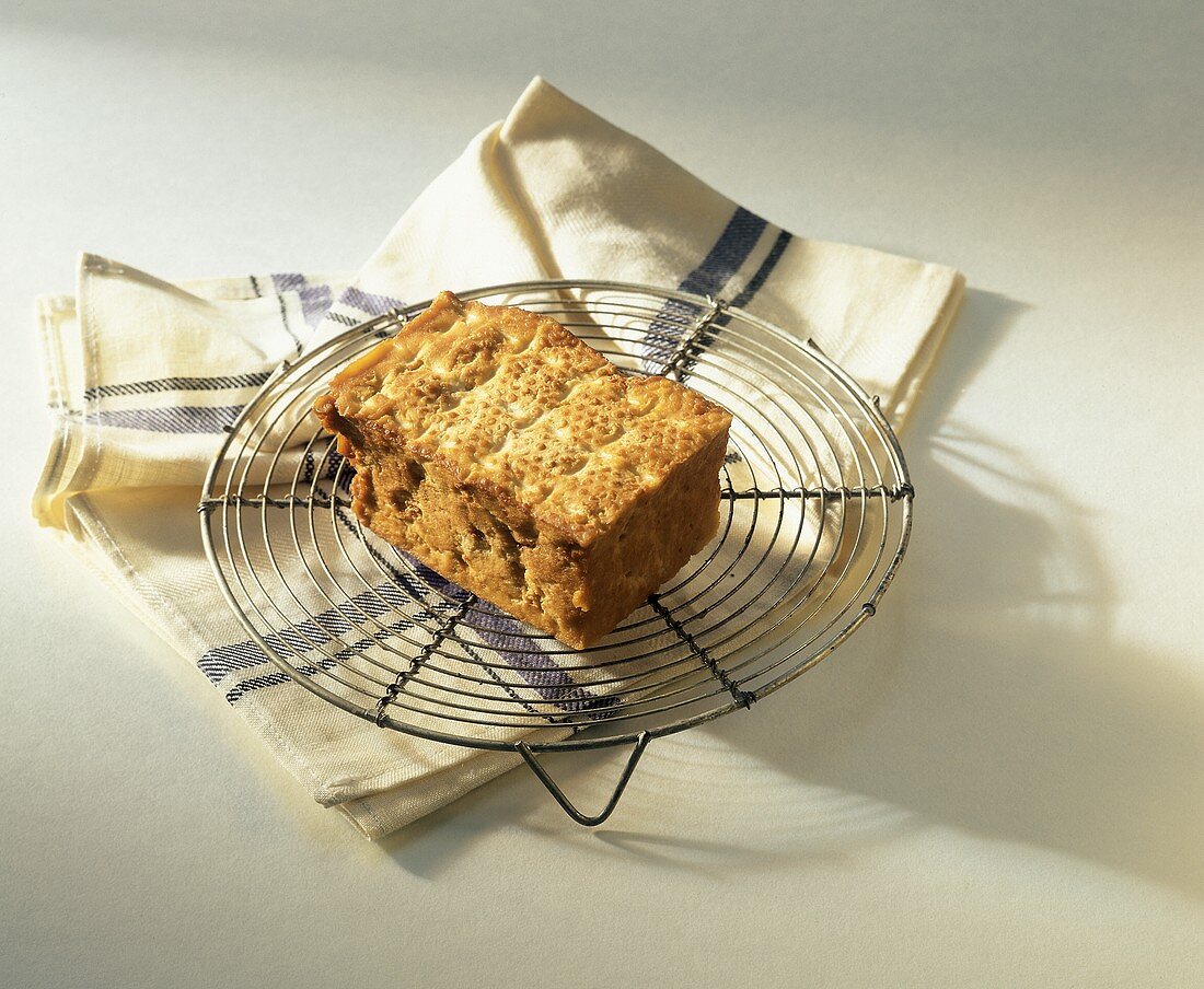 Smoked tofu on cake rack