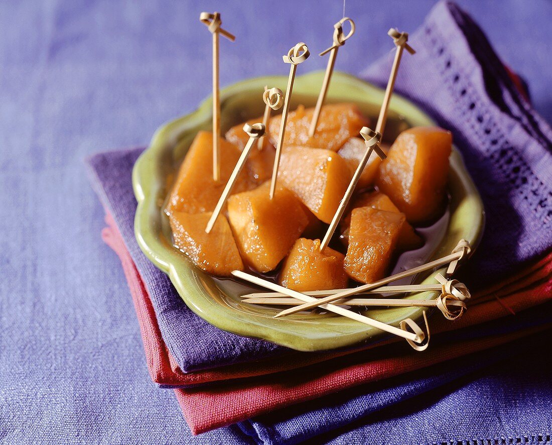 Skewered diced pumpkin in syrup 