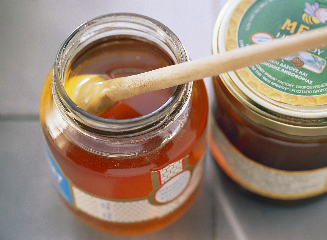 Greek wild flower honey in two jars